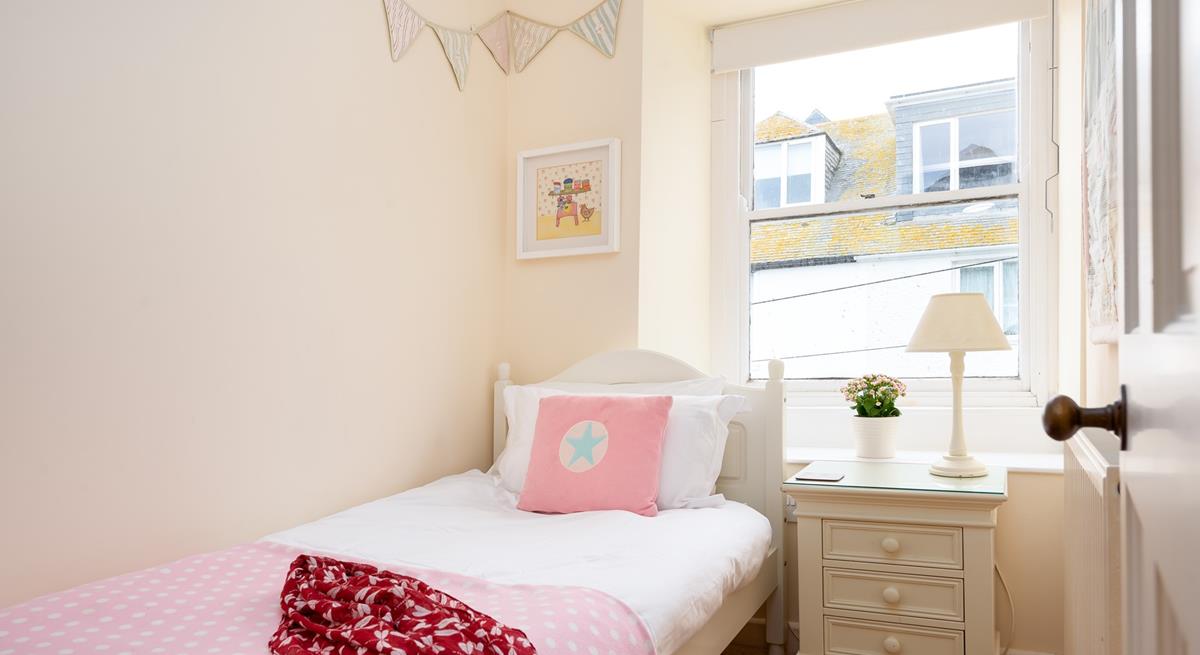 This adorable bedroom is sure to delight children!