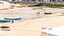 Friendship Cottage looks over the hub of St Ives with local ice creams on sale and lots of fishing activity.