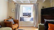 Take a quiet moment to yourself on the cosy armchair and get lost in a good book or simply relax with a hot drink and enjoy the harbour views.