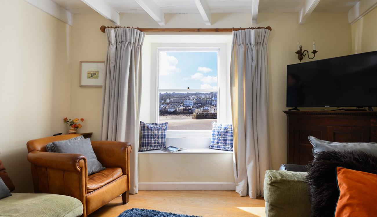 Take a quiet moment to yourself on the cosy armchair and get lost in a good book or simply relax with a hot drink and enjoy the harbour views.