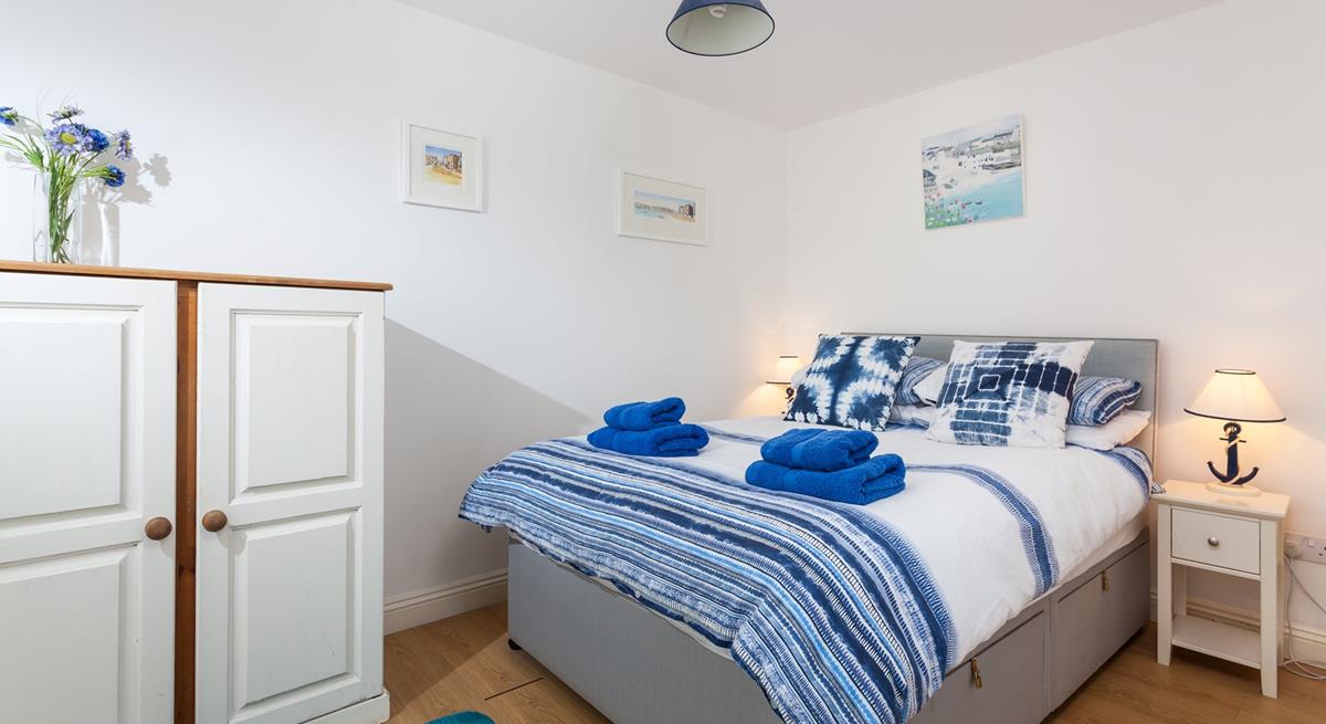 Comfortable crisp linen and super soft towels await in the bedroom.