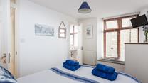 Awake from a dreamy sleep and drift into the en suite to get ready for the day.