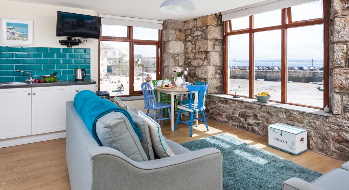 Watch the comings and goings of the harbour from the comfortable sitting room.