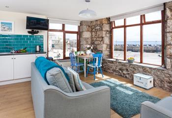 Watch the comings and goings of the harbour from the comfortable sitting room.