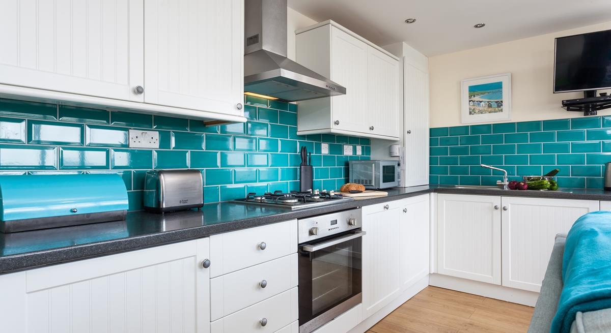 The kitchen has plenty of worktop space to prepare meals and picnics.