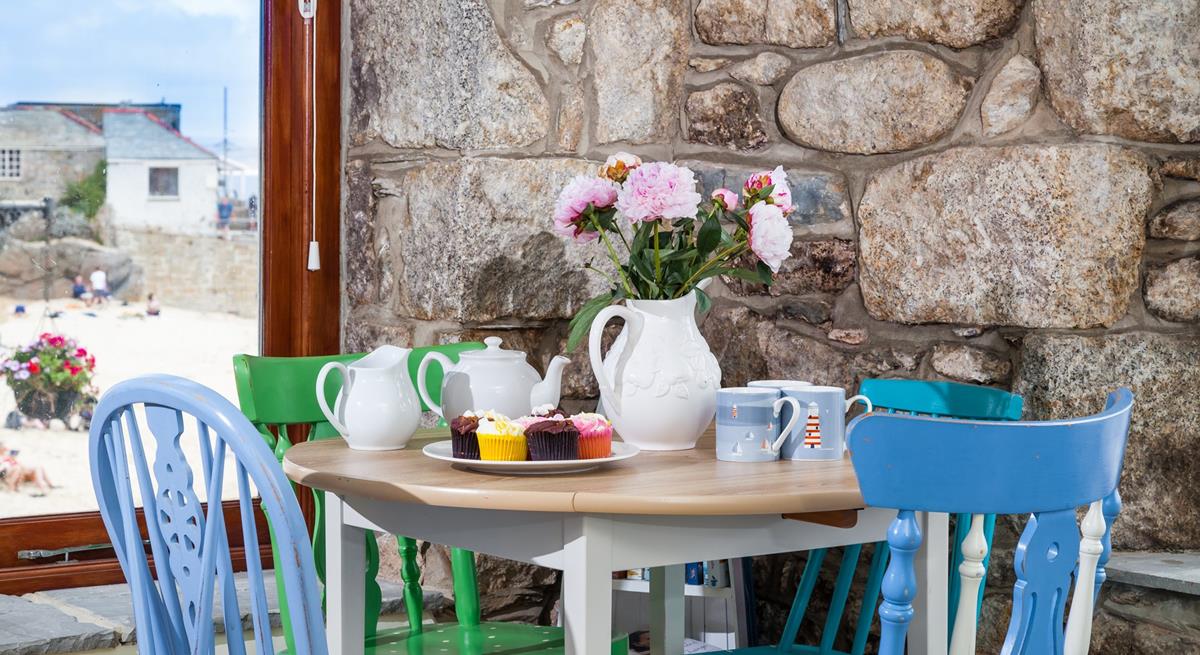 Enjoy a pot of afternoon tea and fluffy cupcakes with the beach backdrop.