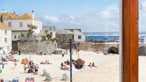 Step out the door onto the cobbled streets to spend the day on the beach.