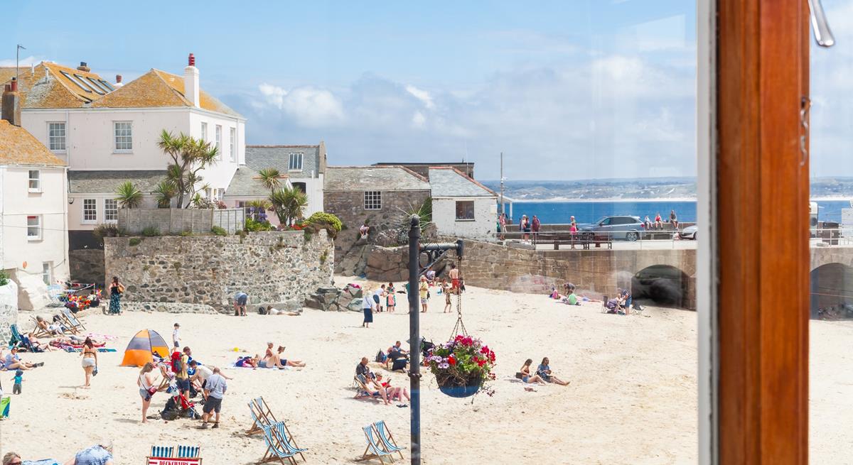 Step out the door onto the cobbled streets to spend the day on the beach.