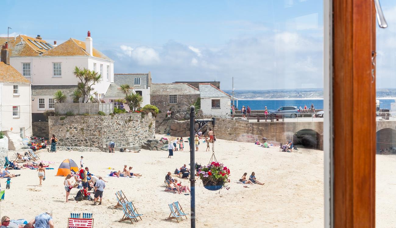 Step out the door onto the cobbled streets to spend the day on the beach.