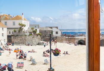 Step out the door onto the cobbled streets to spend the day on the beach.