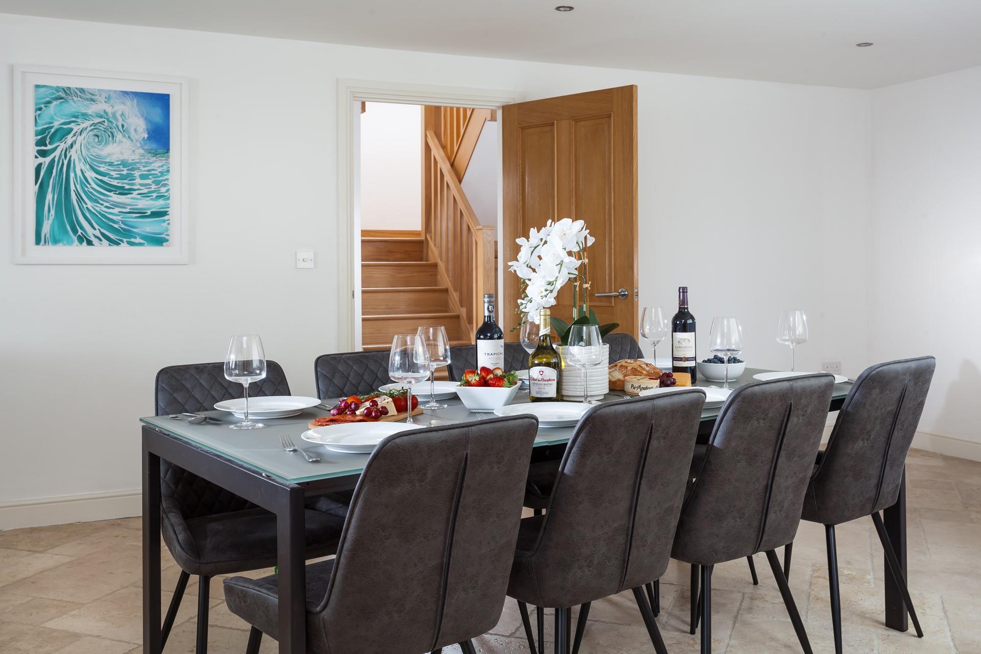 Sit around the dining table and tuck into a delicious home-cooked meal.