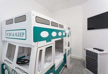 Tuck the kids into the fun camper van bunk beds after a busy day on the beach.