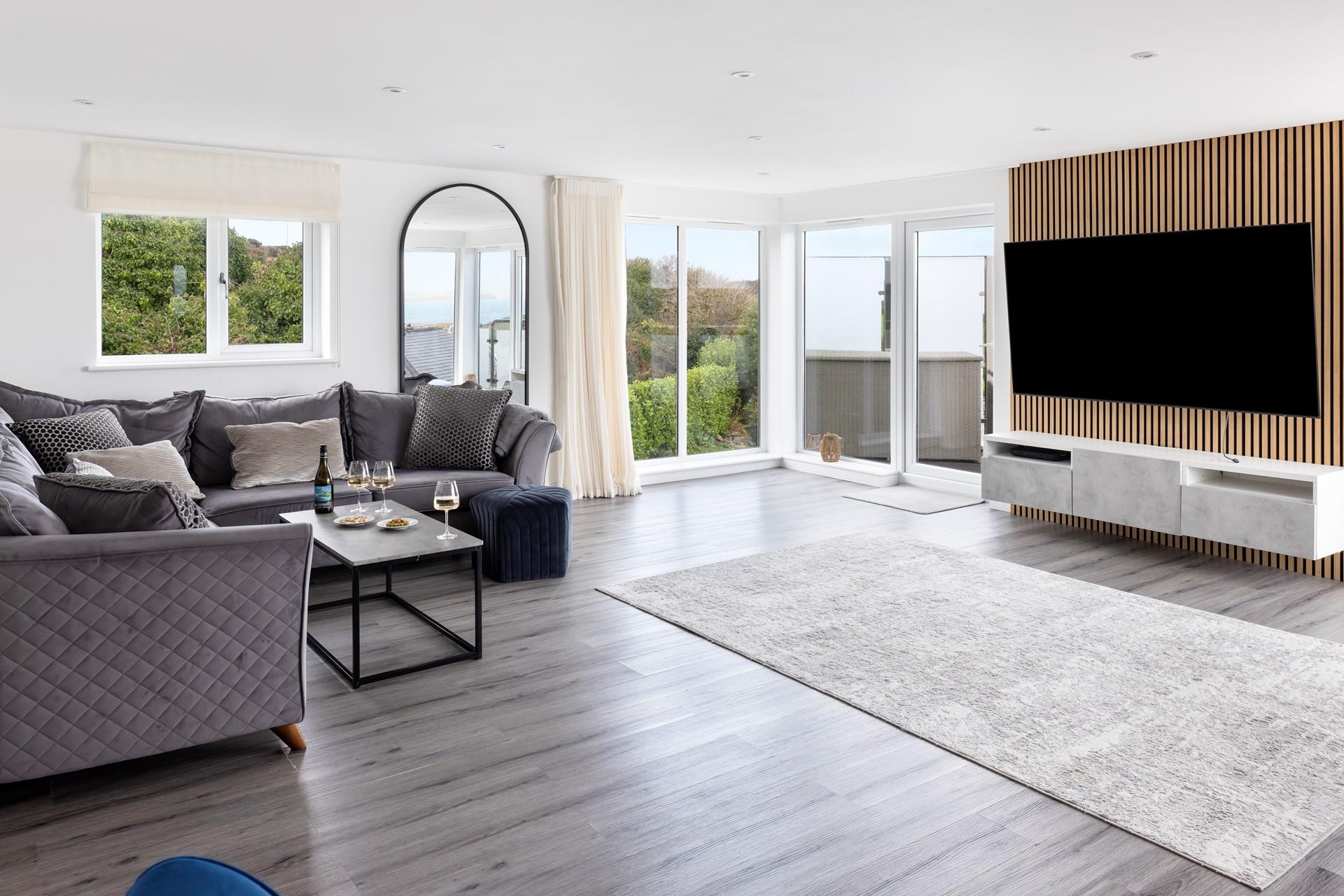 The stylish sitting room is perfect for relaxing nights in.