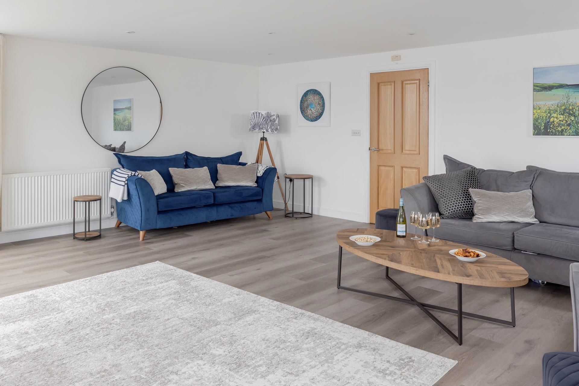 The stylish sitting room is perfect for relaxing nights in.