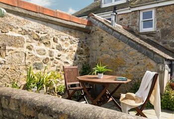 Sip a glass of something cold in your sun trap outside area engrossed in a good book.