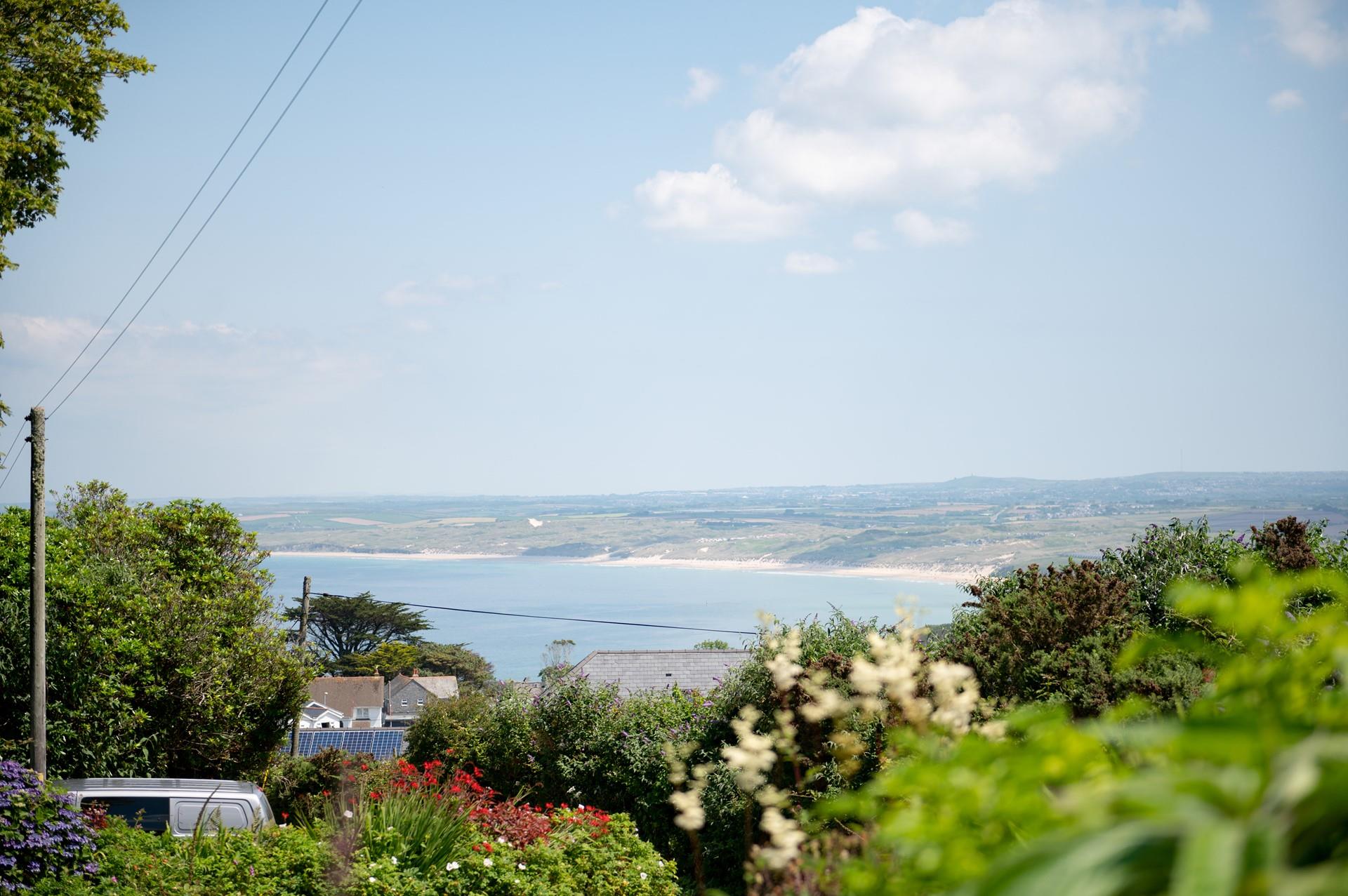 Soak up the peace and tranquillity in your garden and look out to stunning sea views.