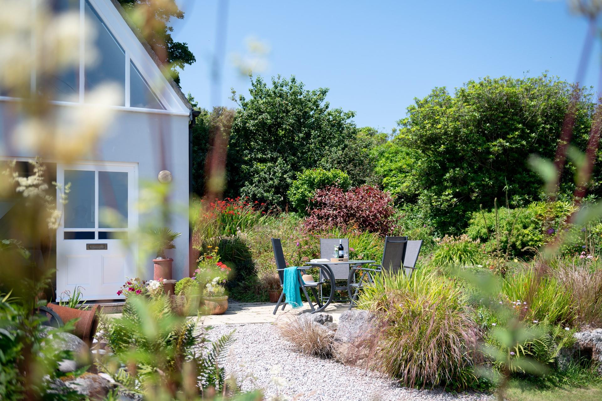 Sip glasses of wine in the sun surrounded by your tranquil garden.