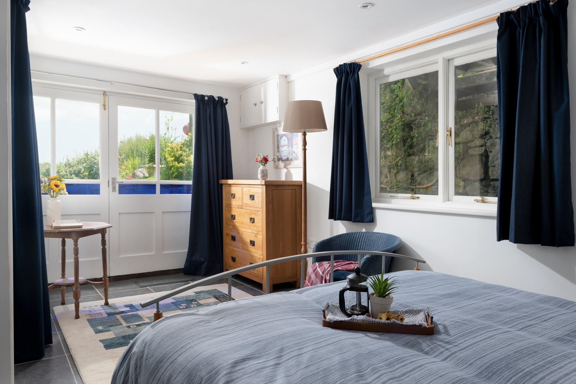 After watching the sun come down in your leafy garden, settle into bed for a blissful night's sleep.