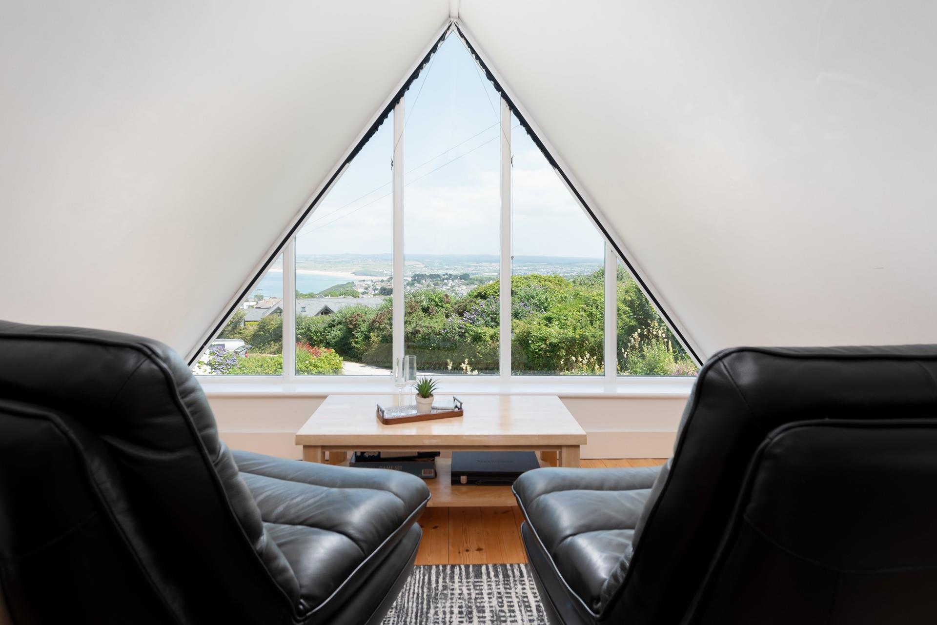 Pop open a bottle of champagne and sit and sip your drink with views of the golden sandy beach.