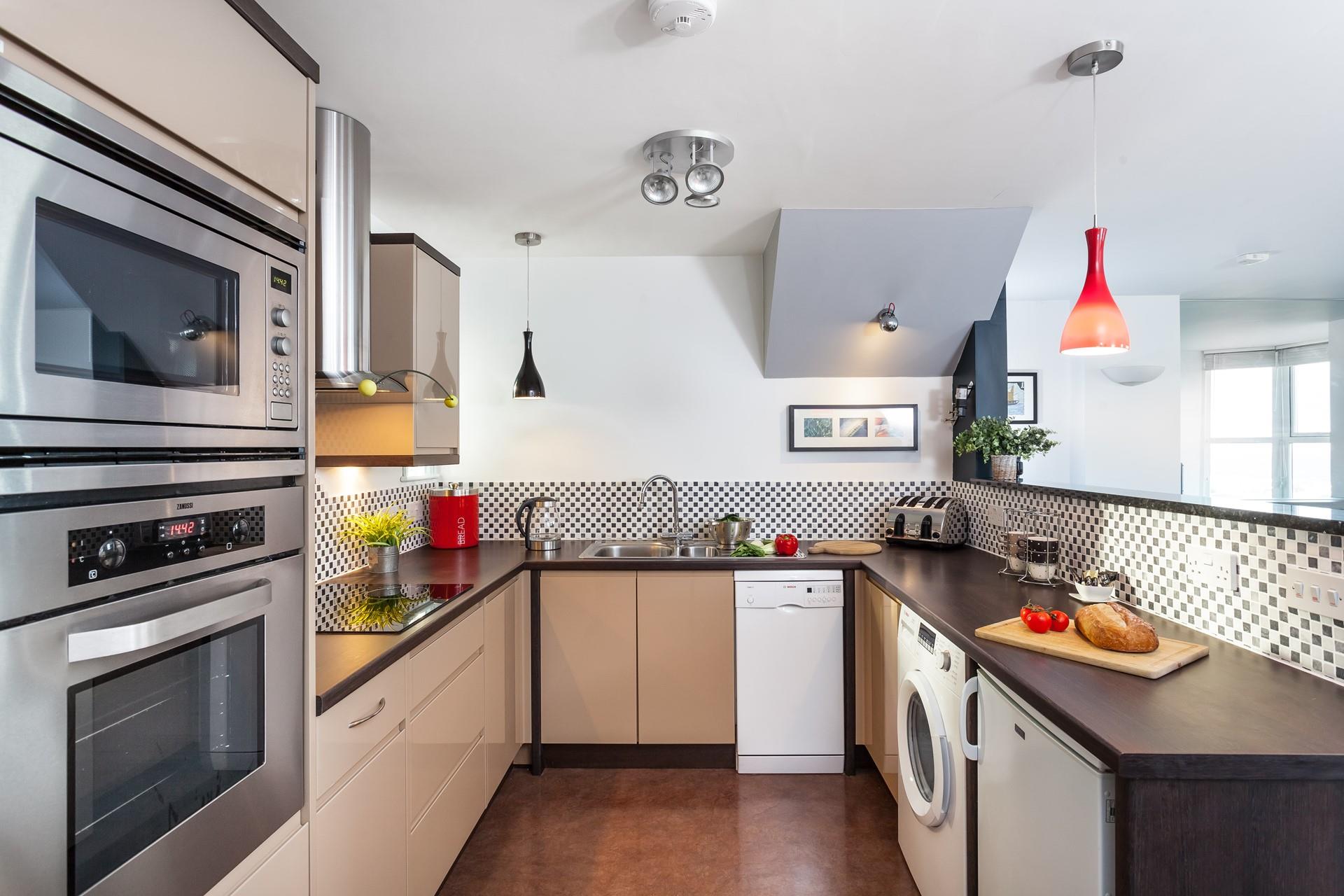 Rustle up a meal or two in the well-equipped kitchen.