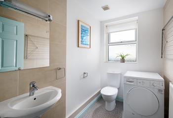 The property benefits from a separate cloakroom, perfect for sorting out your beach gear!