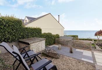 Start the day with a cuppa, watching the ocean.