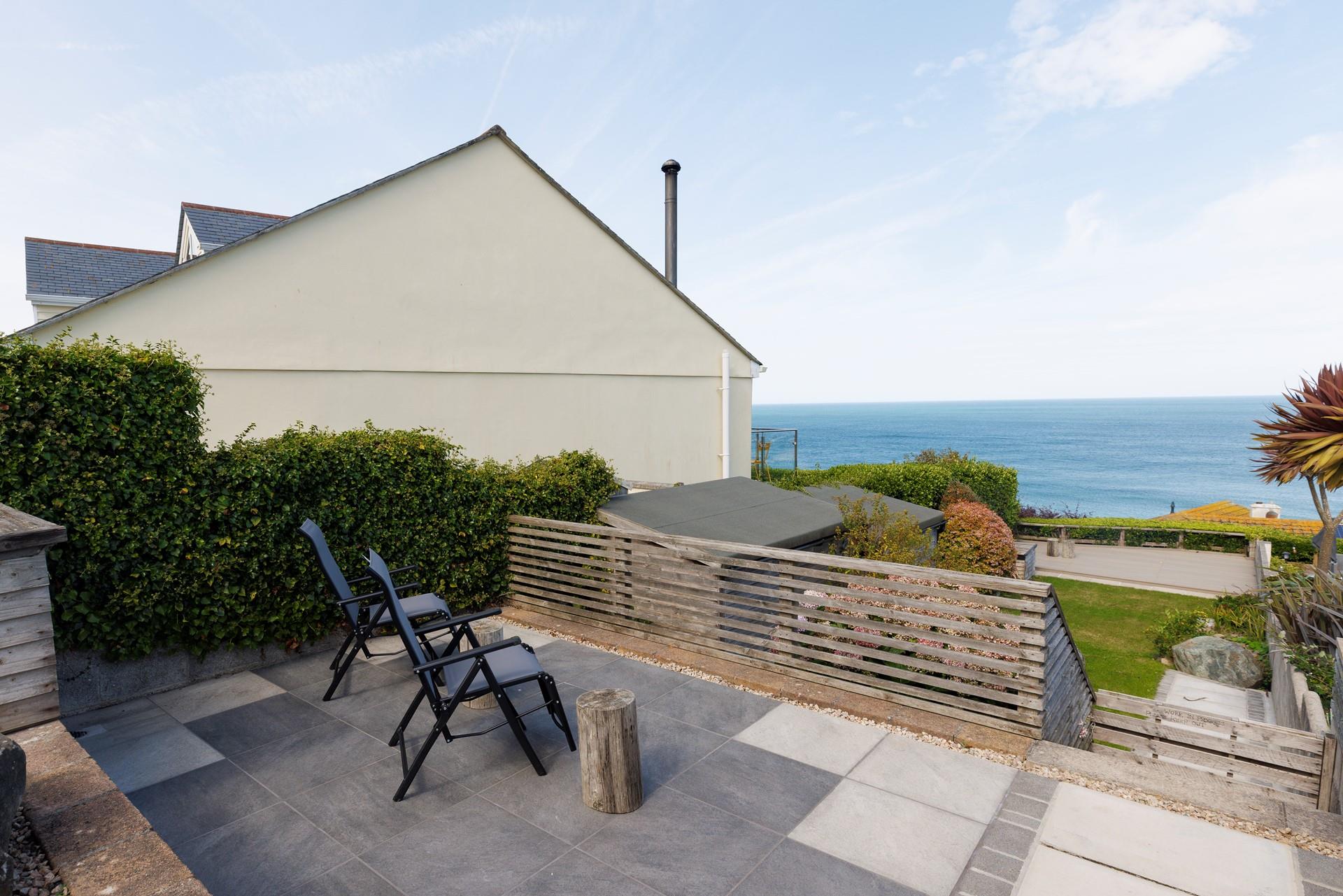 The large patio is ideal for watching the sunset each evening.