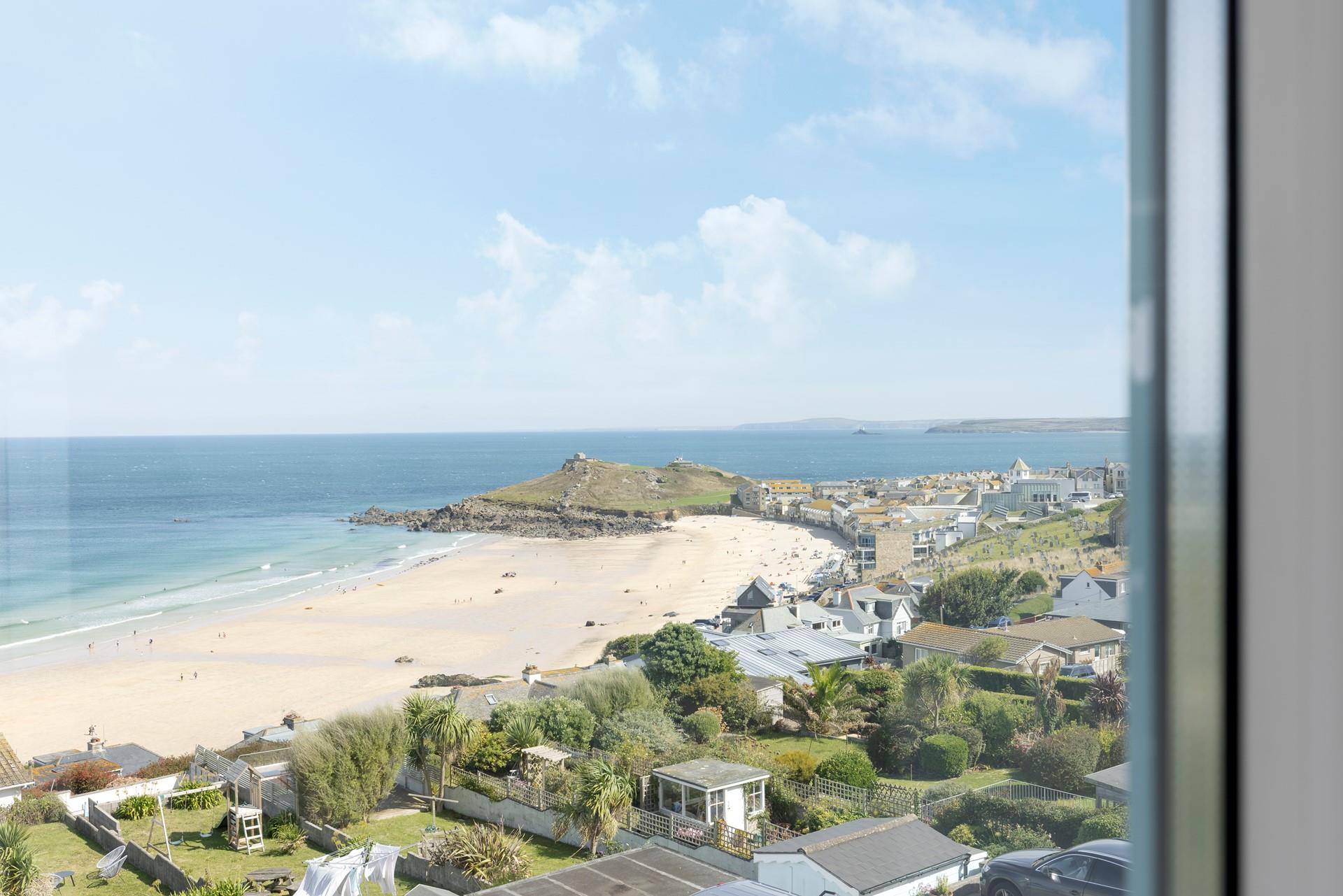 While away the hours as the waves ebb and flow, watching the hustle and bustle of Porthmeor beach. 