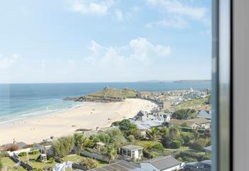 While away the hours as the waves ebb and flow, watching the hustle and bustle of Porthmeor beach. 