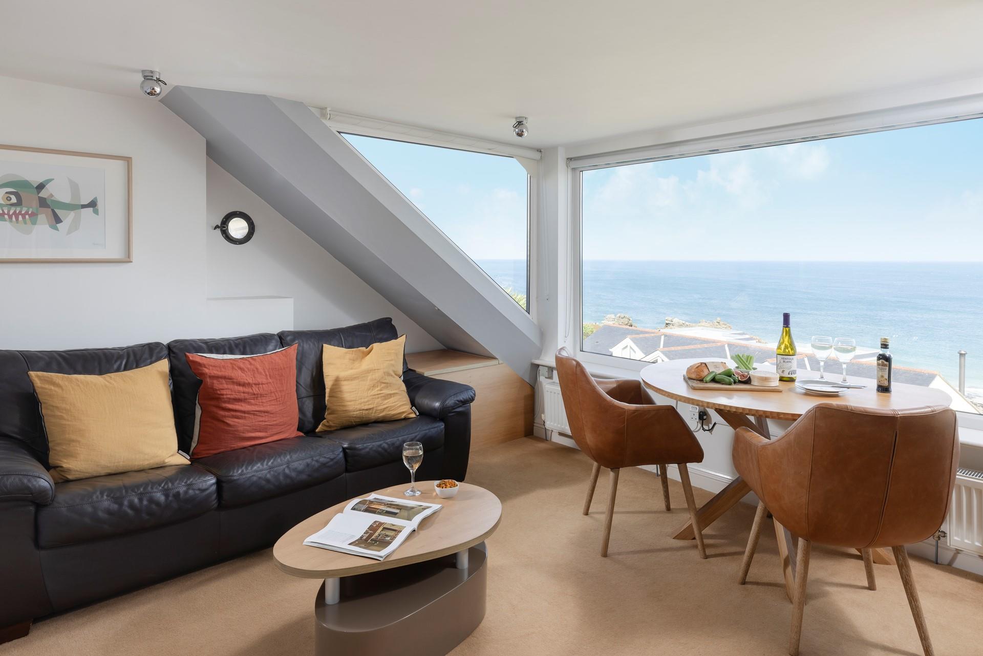 Vast windows make the most of the far-reaching ocean vista.