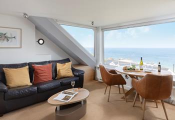 Vast windows make the most of the far-reaching ocean vista.