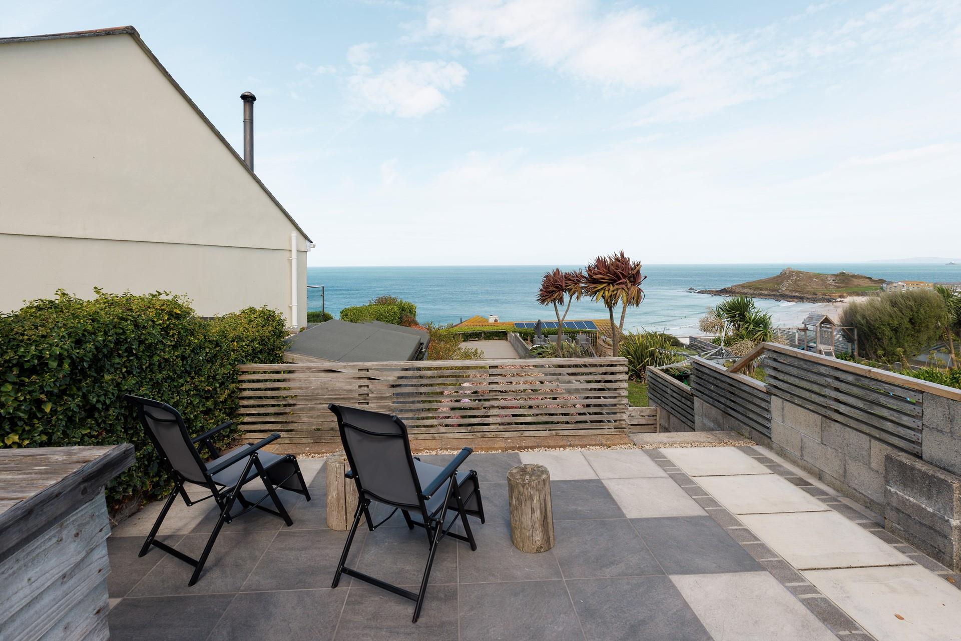 Mor Vista has the use of not one, but two sea-facing terraces!