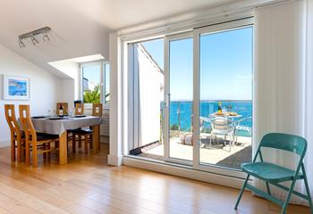Open the doors and enjoy a lazy afternoon on the balcony, soaking up the sun and listening to the waves.