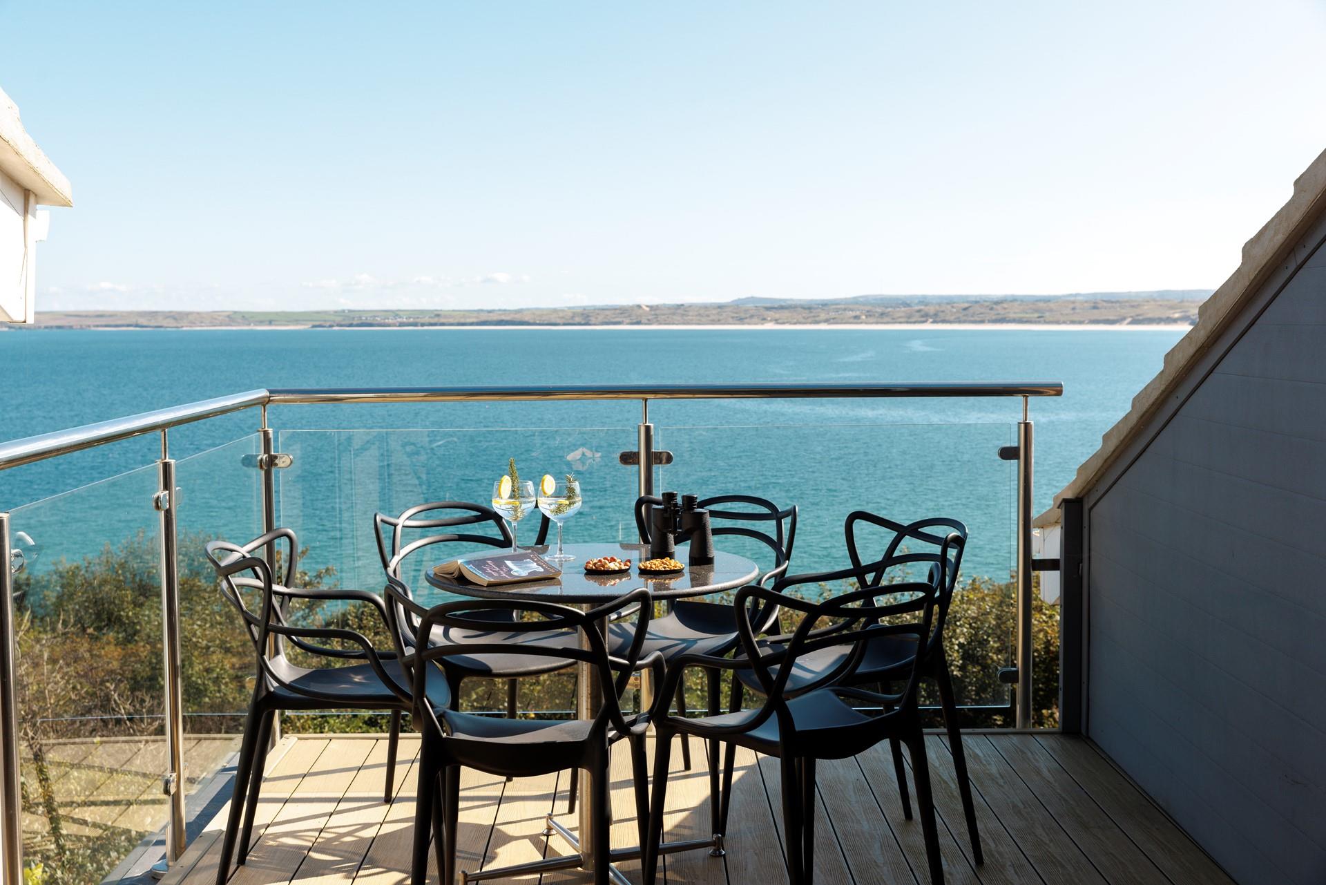 Enjoy these mesmerising sea views with some nibbles and a glass of something chilled in hand.