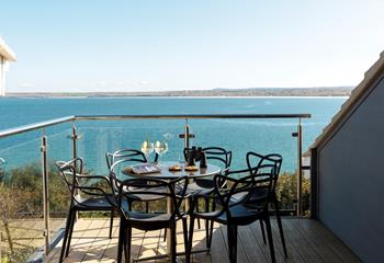 Enjoy these mesmerising sea views with some nibbles and a glass of something chilled in hand.