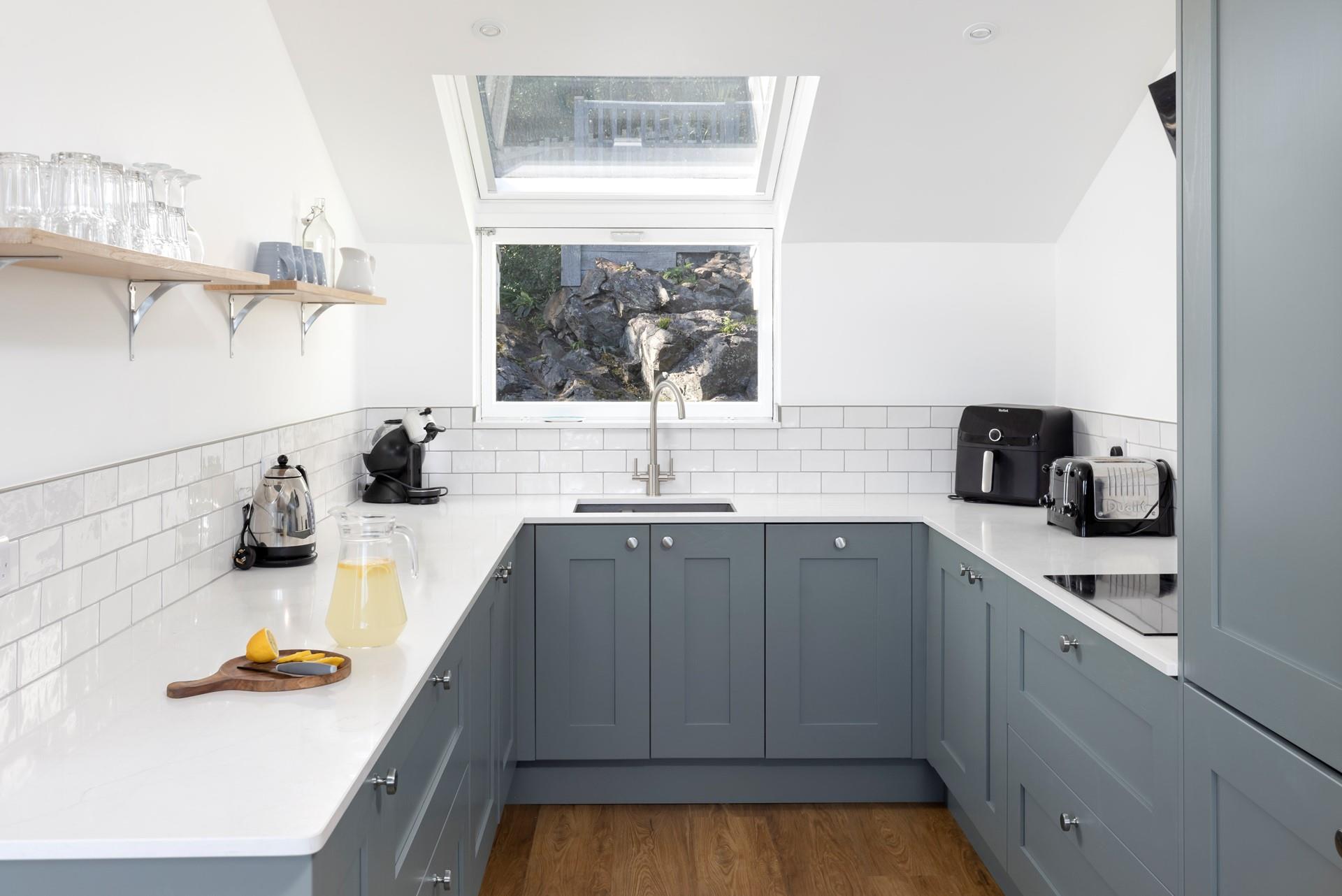 With the bonus of a coffee pod machine and an air fryer, the kitchen is well equipped for all guests' needs!