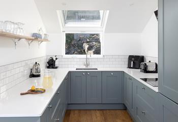 With the bonus of a coffee pod machine and an air fryer, the kitchen is well equipped for all guests' needs!