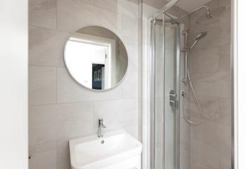 Wash away the sand after trying out your surfing skills.