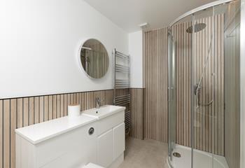 Wash the day away under the rainhead.