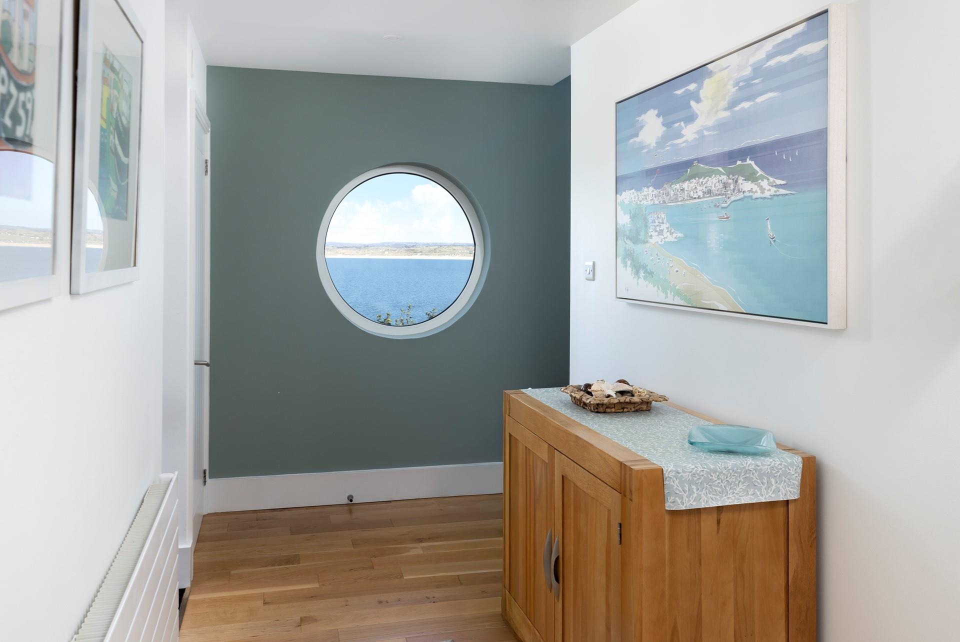 We love the quirky window, perfect for checking the day's weather!