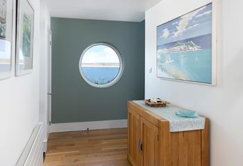 We love the quirky window, perfect for checking the day's weather!