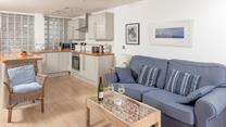 Sink into the sofa and relax after a day of exploring.