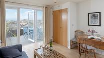 Cook up a storm in the kitchen before relaxing in the sitting room.