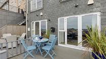 Sip a cuppa on the terrace in the sun.