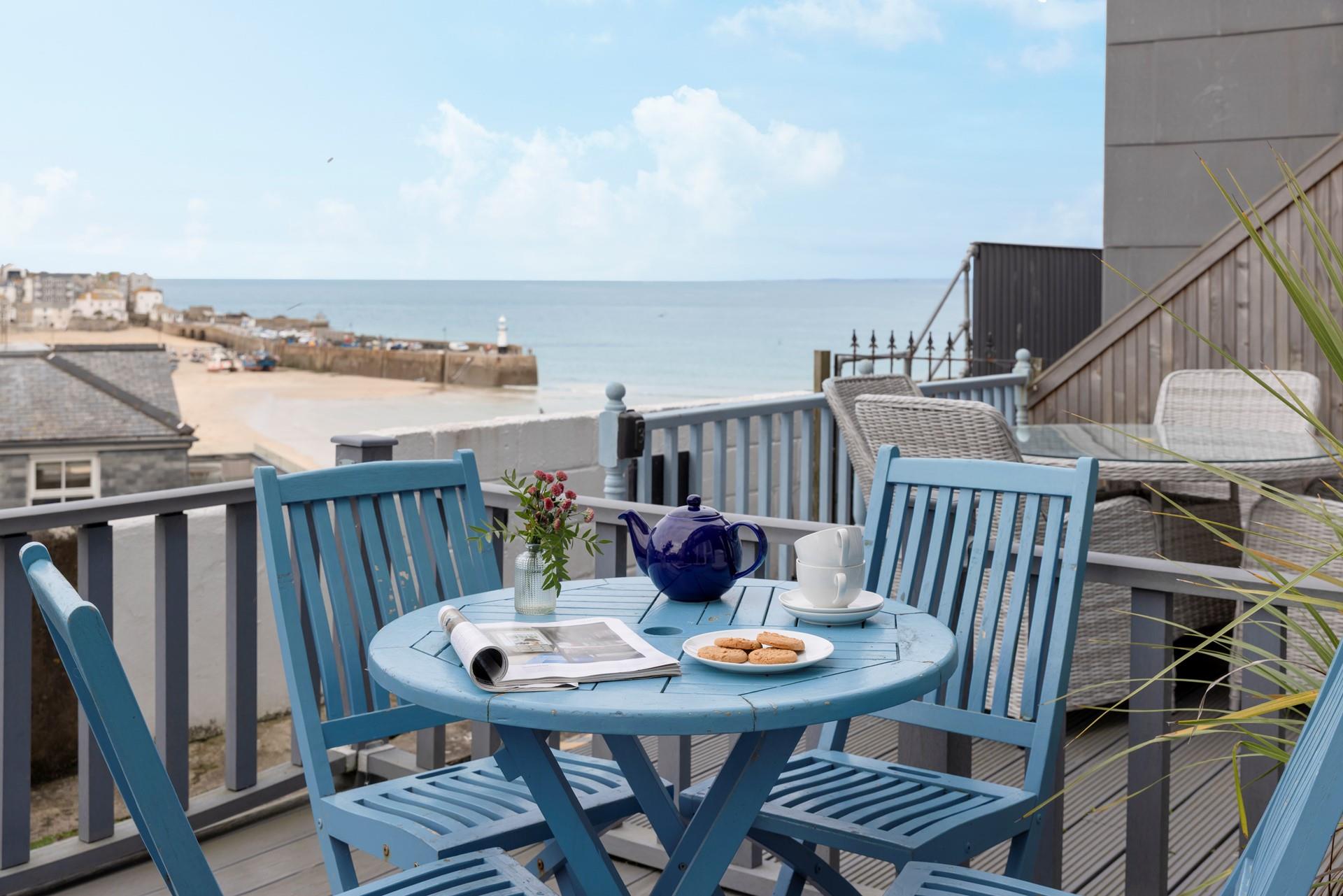 Sink into relaxation mode as you sip a cold beverage on the balcony.