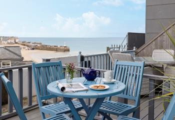 Sink into relaxation mode as you sip a cold beverage on the balcony.
