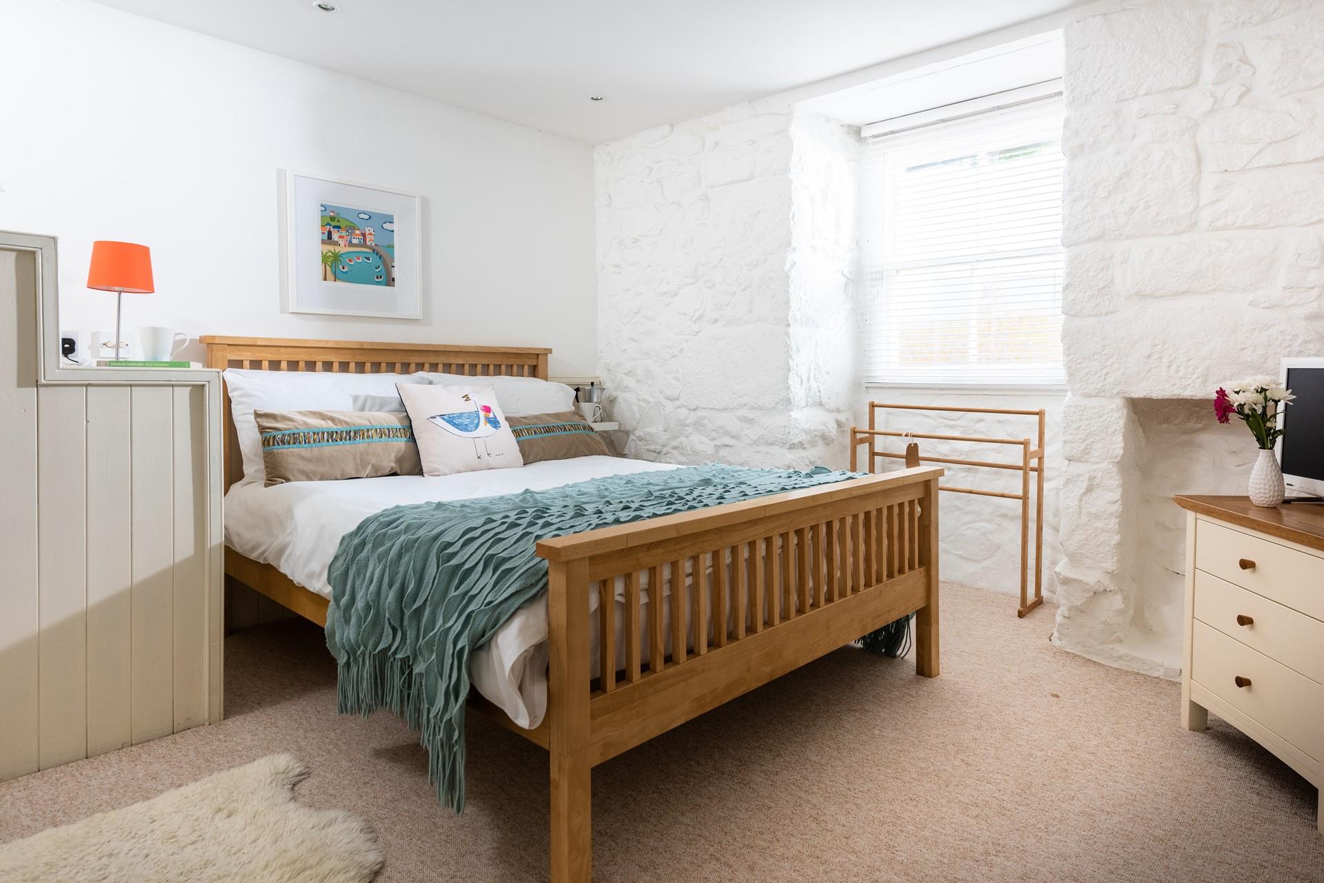 Calming neutrals create a relaxing sanctuary.