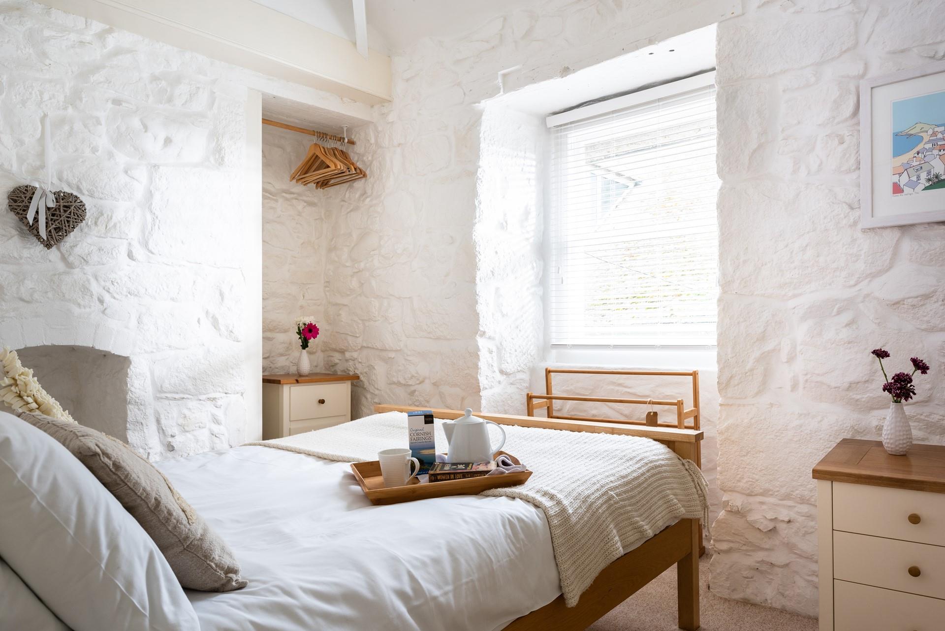 Settle into bed after a long day relaxing on the beach.