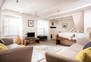 The large sitting area has bedrooms leading off and provides a cosy base in the evenings.
