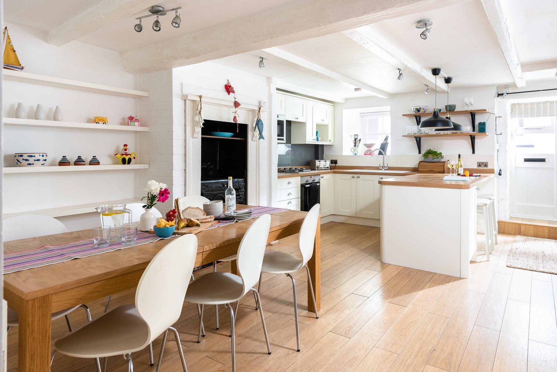 Large spacious kitchen and dining area, perfect for family meals.